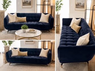 Blue velvet tufted sofa