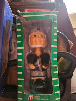Raider bobbing head doll