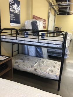 Bunk bed with mattresses