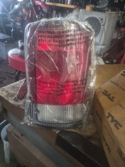 Right Side Tail Light Cover For A 95 TO 03 Econoline Or A 00-03 XCRSN