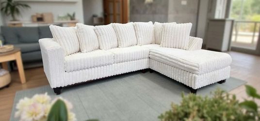 NEW IVORY SECTIONAL SOFA, INCLUDING FREE DELIVERY ORDER HERE PAY UPON ARRIVAL