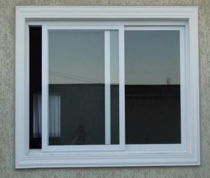 White Sliding Window with Glass Panes