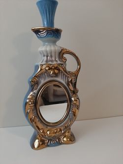 Vintage Bottle of whiskey comes with a Mirror