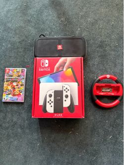 Nintendo switch OLED + Mario Kart 8 Deluxe and Gyro steering wheel