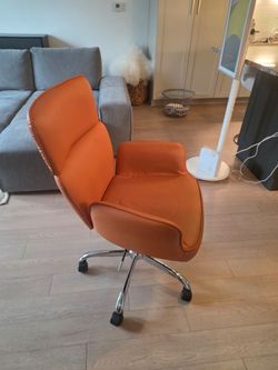 “Orange Retro Swivel Office Chair – Mid Century Style”