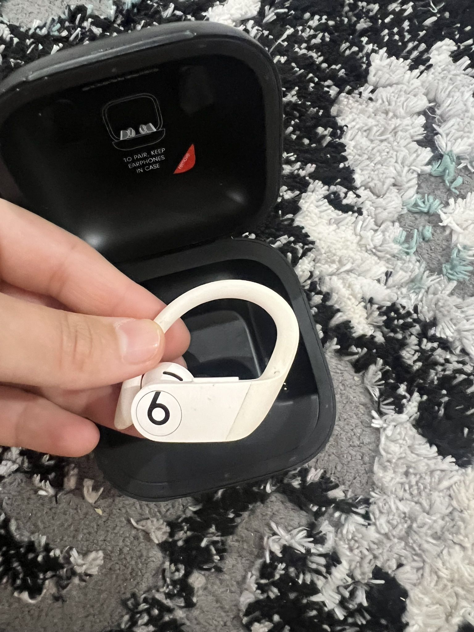 Dr Dre Power Beats Left Side Bud And Charging Case. 