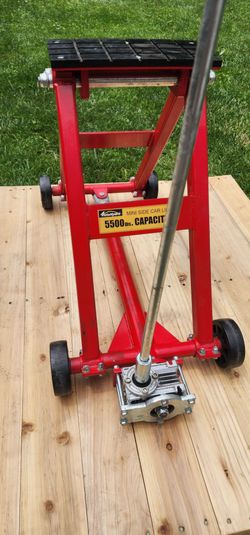 Heavy-dury floor jack excellent condition.