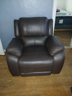 Brown faux leather recliner