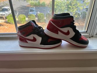 Air Jordan 1 Mid Patent Leather Sneakers