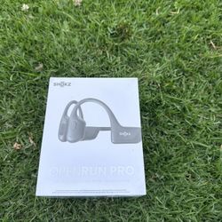 Open run pro headphones 