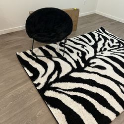 Zebra Print Rug And Chair 