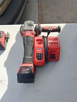 Milwaukee fuel angle grinder,battery +charger