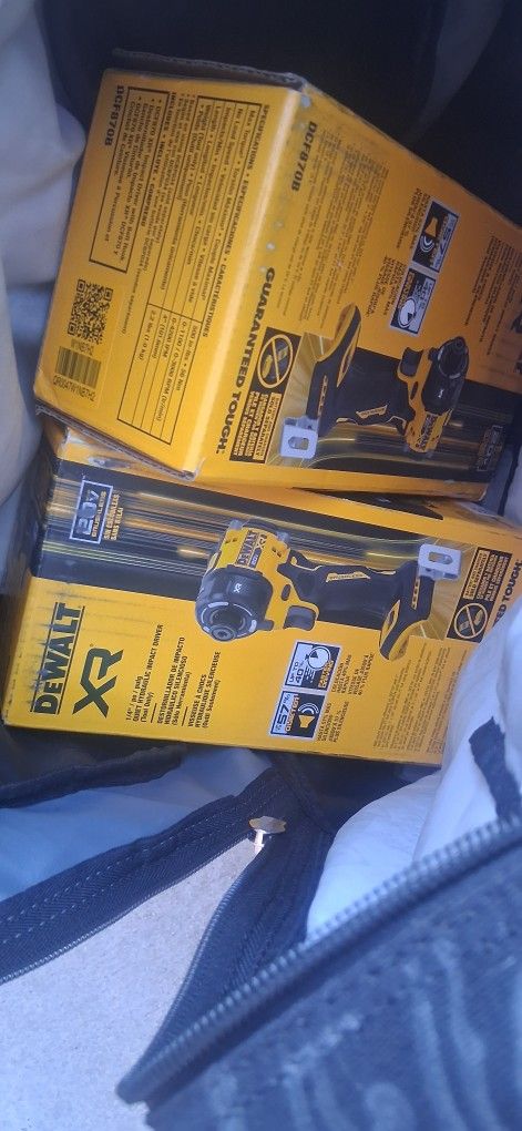 Two Dewalt Quarter Inch Hex Pulg Impacts