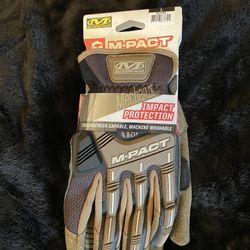 These are Mechanix Wear M-Pact Covert Gloves, designed for impact protection and tactical use.