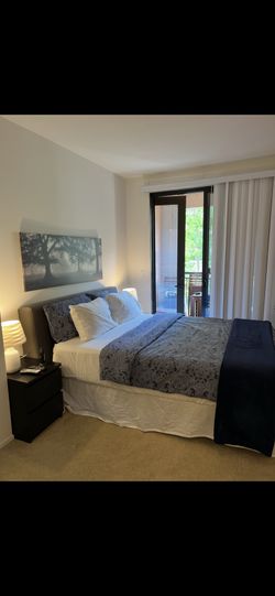 Queen Bed with Adjustable Base – Good Condition