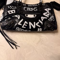 Balenciaga Classic City graffiti-print leather bag in black and white. 