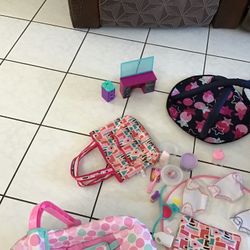 Toys like new, playpen, stroller, washing machine and dryer that make noise, bags, cloth diapers, cup and various other very nice and clean items