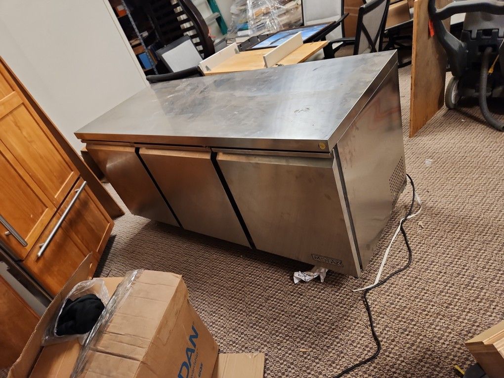 Commercial six foot stainless steel food prep table with under counter refrigerator