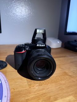 Nikon D5500 digital camera with 50mm lens