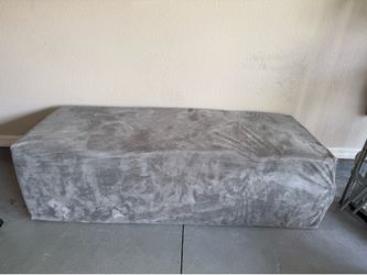 Large suede bench/couch/ ottoman. Excellent condition. Pet and smoke free home. Pick up Oviedo.