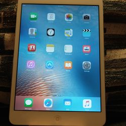 iPad mini  year 2012 with a protector case and an external keyboard