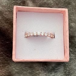 - Beautiful and New!  Cubic Zirconia Eternity band Sz 7