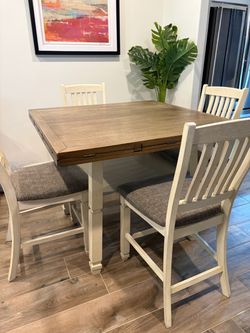 Ashley Bolanburg Counter Height Dining Table with 4 chairs.