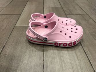 baby pink crocs size 10W/9M