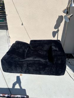 Black chaise in a box