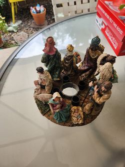 Nice 4 piece Nativity, candle holder