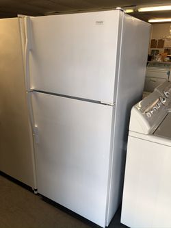 Used Maytag top and bottom fridge. 1 year warranty
