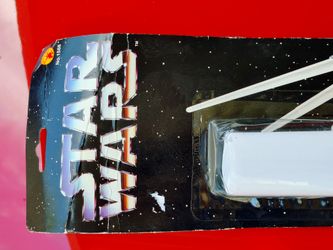 Vintage 1995 Lucas Film LTD Pre Disney Rubie's Costume Co. Star Wars Expandable Battery Lightsaber on original card packaging.