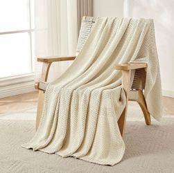 Cream color cable knit throw