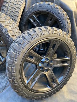 24" Texas Carbon Edition Rims and 35 12.50 24 Fury M/T Mud Tires