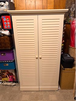Craft & Sewing Armoire with fold up Table and mirror.