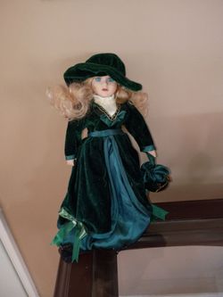 Velvet dressed doll with stand