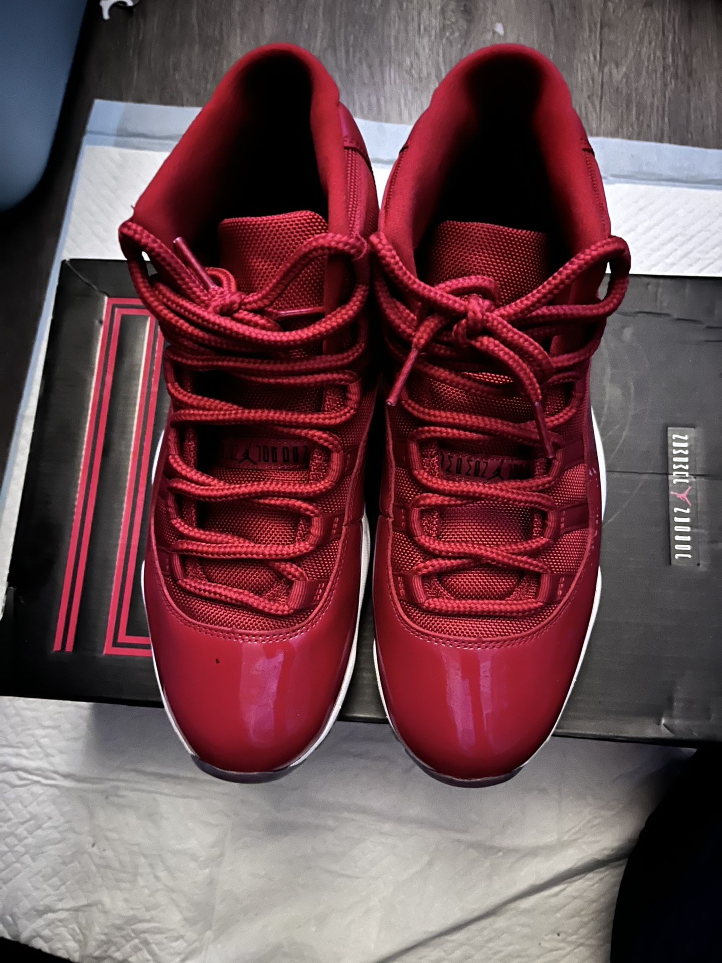 Slightly worn cherry red jordan 11s size 10