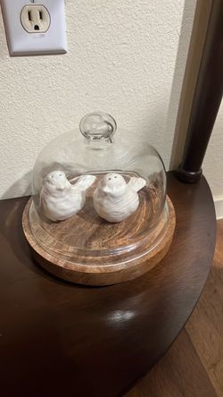 Salt and pepper birds with glass decor