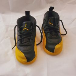 Jordan size 9c black and gold. 