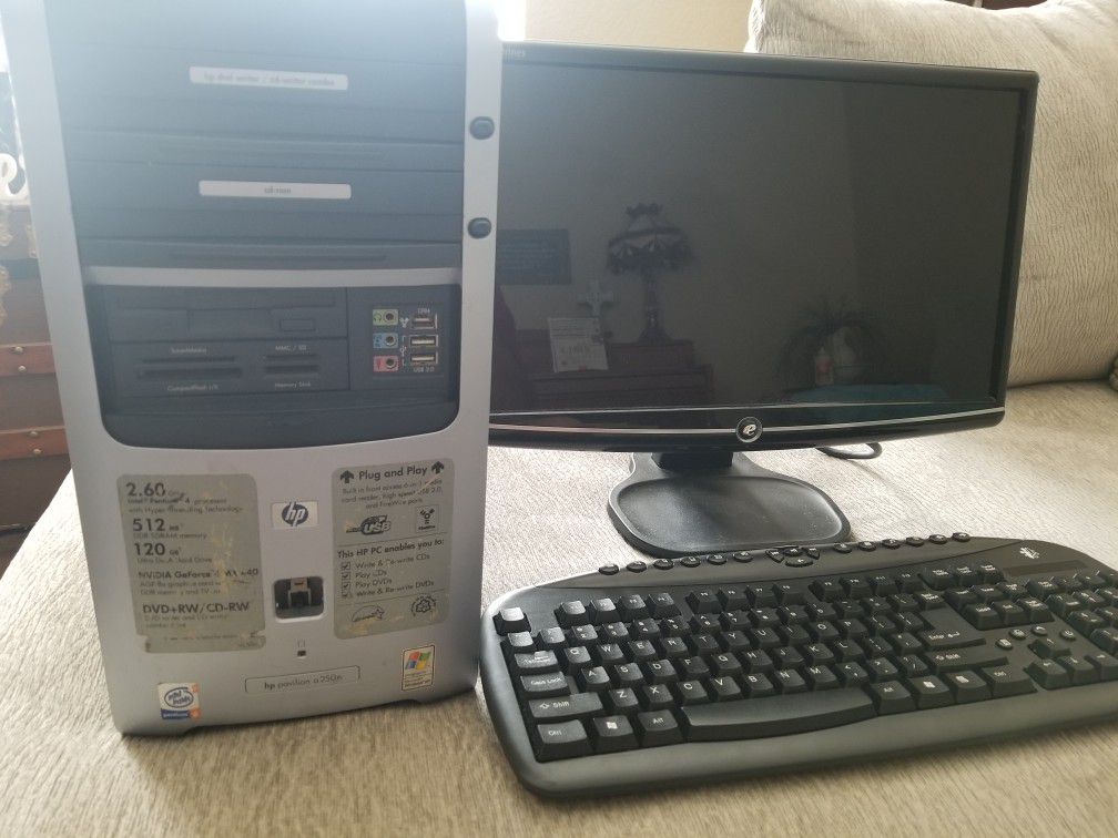 Hp desktop windows xp pro with led monitor and wireless keyboard and mouse and speakers