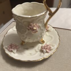 Porcelain tea cup with saucer