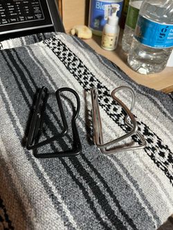 2 bicycle water bottle cages $10 for both