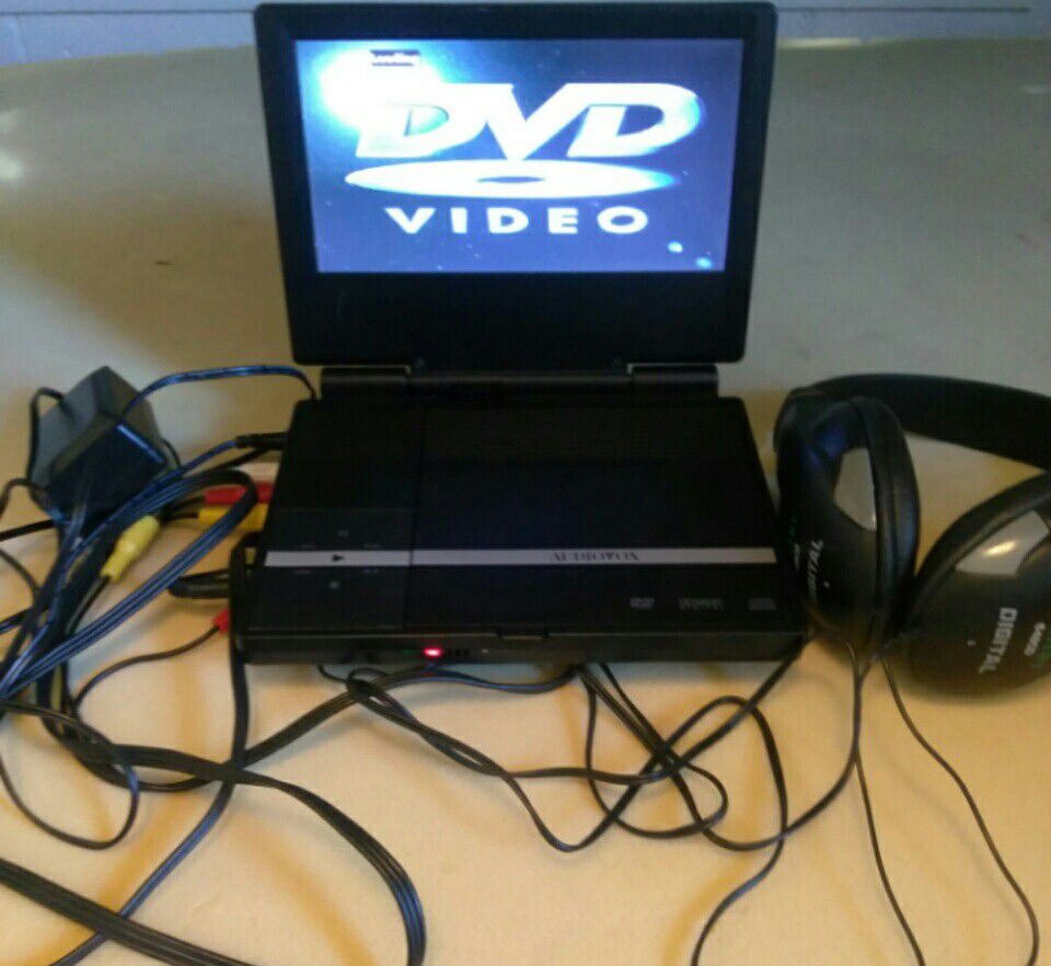 Portable DVD Player with Charger, Headphones & Cable to hook to TV