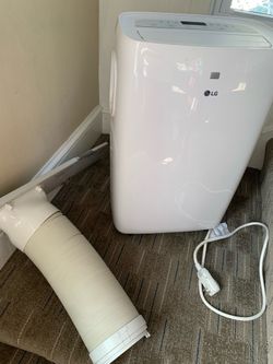 LG brand Portable AC unit with Remote and All parts of Window exhaust assembly