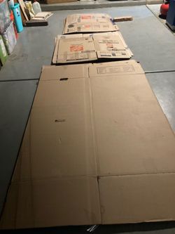 Moving boxes including wardrobe boxes
