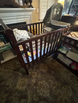Baby crib with mattress and matching changing table