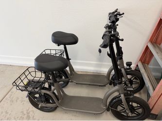 2 matching electric scooters