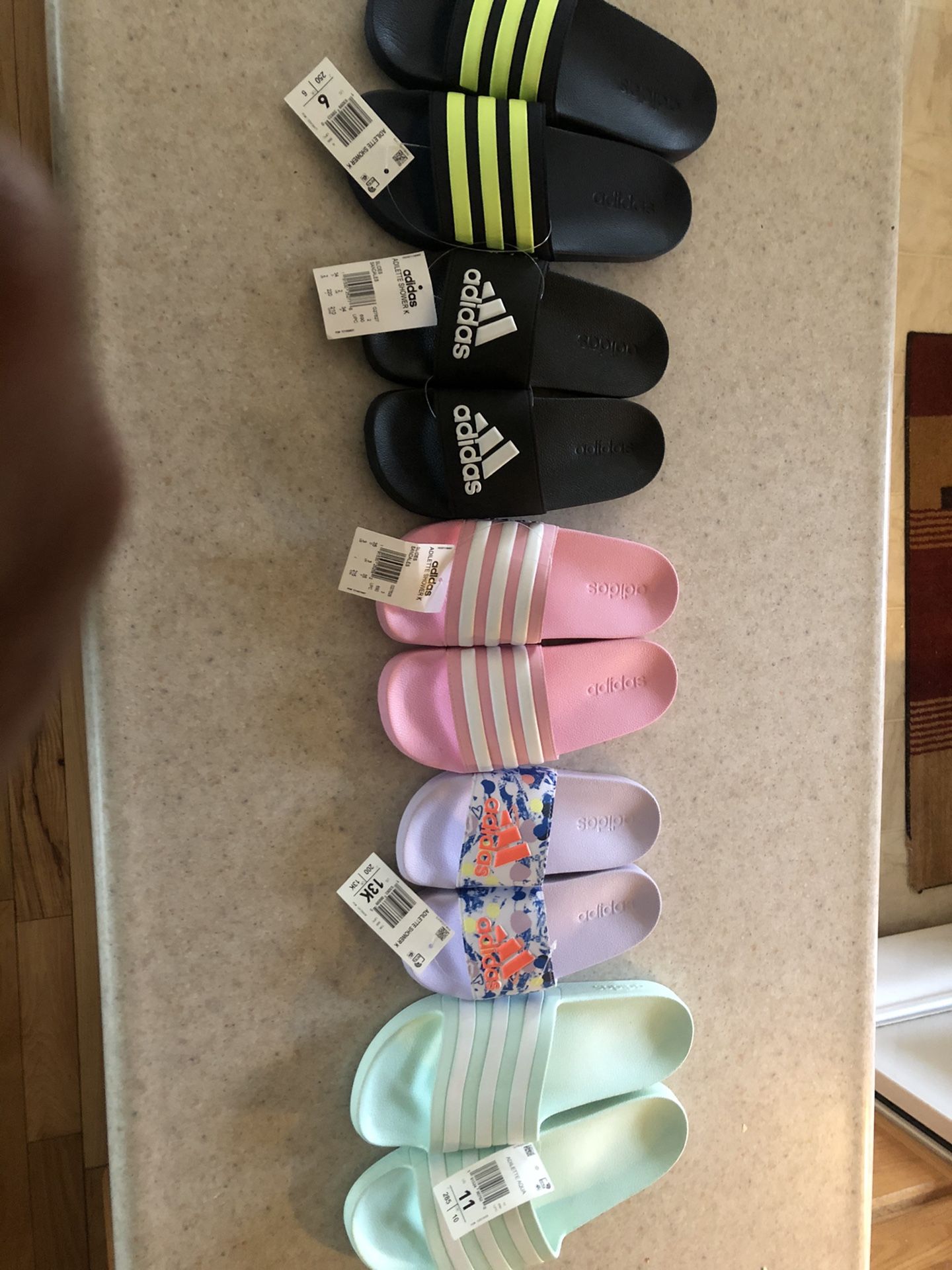 Nike and Adidas Slides,Size is in photo.New Never Worn! Going fast!