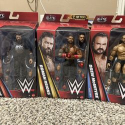 wwe elite collection roman reigns and drew mcintyre lot wrestling figures wrestling toys