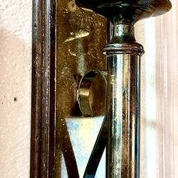 Beautiful and elegant set of two wall mounted candle holders with dimensions H19xL4xD5.5 inch LbsSet 5.6. This is a beautiful set made of brass on woo